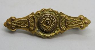 A 9ct gold brooch, 3.8cm wide, 1.5g.