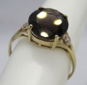 9ct gold smoky quartz and diamond ring, stamped 9k 375, size O.