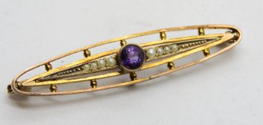 An Edwardian 9ct gold amethyst and seed pearl brooch, 4.5cm wide, 3.2g.