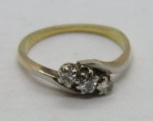 A three stone diamond ring, hallmarks worn, size J-K, 2.1g.