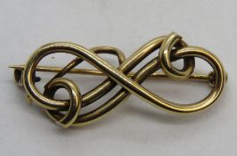 A 10ct gold brooch, 3cm wide, 2.3g.