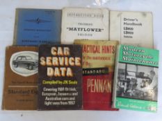 A quantity of automotive handbooks including motorcycle maintenance book.