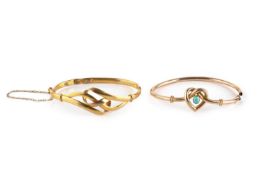A stone set bangle, of hollow hinged oval form, the heart-shaped panel centred with a turquoise-
