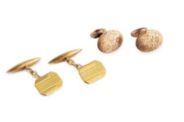 A pair of 18ct gold cufflinks, with octagonal engine-turned panels, on baton and chain-link