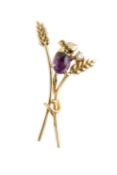 An amethyst and diamond mouse brooch, modelled as a field mouse on a sheaf of corn, highlighted with