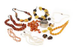 A collection of jewellery, comprising a white metal hinged bangle, engraved with flowerheads and