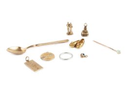A collection of jewellery, comprising a hardstone seal fob, with hinged compartment, an opal
