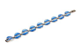 A Norwegian blue enamel bracelet by David Andersen, designed as a line of repeating leaf panels