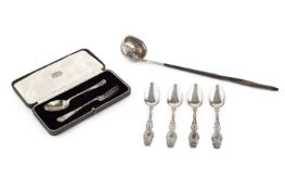 A George II silver toddy ladle, with coin inset swag decorated bowl, and whalebone twist handle,