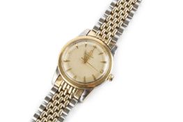 A 'Seamaster' automatic bracelet watch by Omega, the circular dial with gilt Arabic quarters,