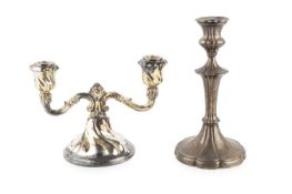 An Edwardian silver candlestick, with fluted knopped column and lobed, weighted base, by Walter