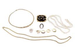 A collection of jewellery, comprising a half pearl set memorial brooch, applied with a foliate spray