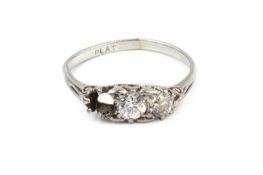 A diamond dress ring, the graduated old brilliant-cut diamonds in claw setting, white precious metal
