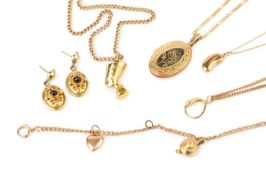 A collection of jewellery, comprising a 9ct gold Egyptian figural pendant on chain, a 9ct gold
