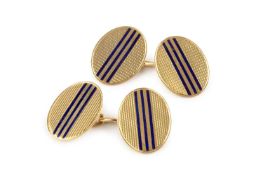 A pair of 18ct gold and enamel cufflinks, each oval engine-turned panel with linear blue enamel