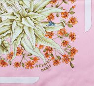 A 'La Prairie' silk scarf by Hermès, designed by Antoine de Jacquelot, depicting a cluster of