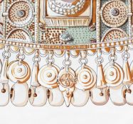 A 'Terres Precieuses' silk scarf by Hermès, designed by Annie Faivre, depicting precious gems of