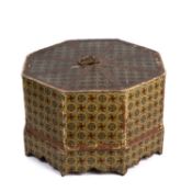 A decorative box and doll's tea set