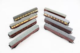 Eight OO gauge coaches.