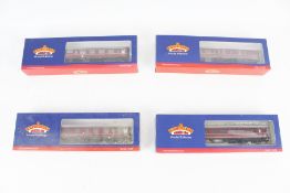 Four Bachmann OO gauge coaches.