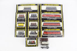 Fourteen Graham Farrish N gauge goods wagons.
