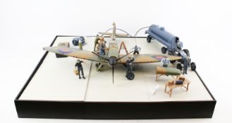 An Air Power model Spitfire Mk 1 and accessories.