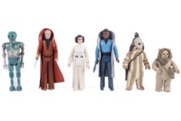 A collection of Star Wars figures.