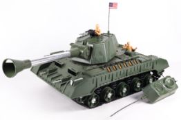 A vintage battery operated 'Mighty Joe' remote control toy tank, boxed.
