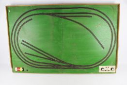 A hand constructed N gauge track layout and assorted buildings and accessories.