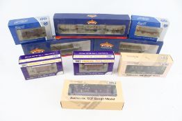 Nine OO gauge wagons. To include bogie wagons, mineral wagons etc.