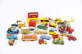 An assortment of playworn diecast.
