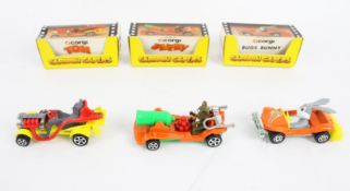 Three Corgi Capers diecast cars.