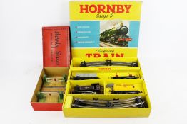 A Hornby O gauge no 45 Tank Goods train set and a A812 Level Crossing no 1.