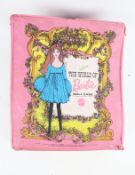 Three vintage Barbie dolls and accessories.