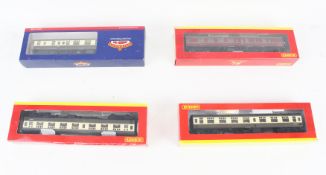 Four OO gauge coaches.