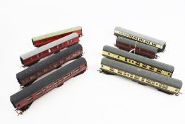 Eight OO gauge coaches.