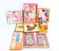 A collection of dolls and clothing including a Sindy Fashion Faces set. Mostly boxed.