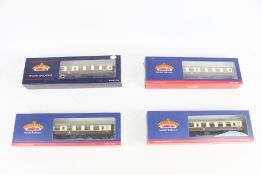 Four Bachmann OO gauge coaches.