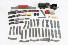 A Lone Star train set, circa 1950s, and one O gauge Bing clockwork locomotive and tender.