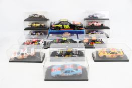 Fourteen diecast Nascar cars.