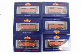 Six Bachmann OO gauge cattle wagons.