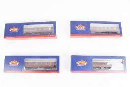 Four Bachmann OO gauge coaches.