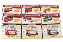 Nine diecast British buses.