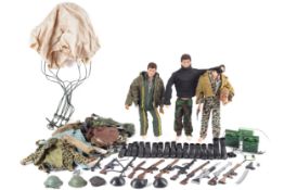 Three Palitoy Action Man figures. With a range of clothes and accessories, etc. One missing head.