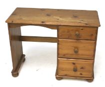 A contemporary pine desk.
