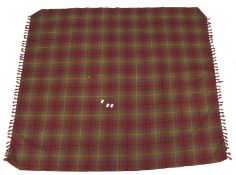 A Mulberry throw in a chequered fabric with tassels to either end.