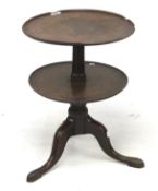 A two tier oak dumb waiter.
