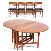 A mid-century double gateleg dining table and four chairs.
