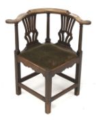 A Victorian mahogany corner chair.
