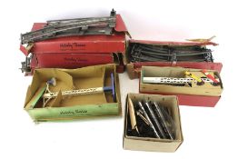 An assortment of O gauge accessories. Including track, a boxed No.2E Lamp, a boxed No.